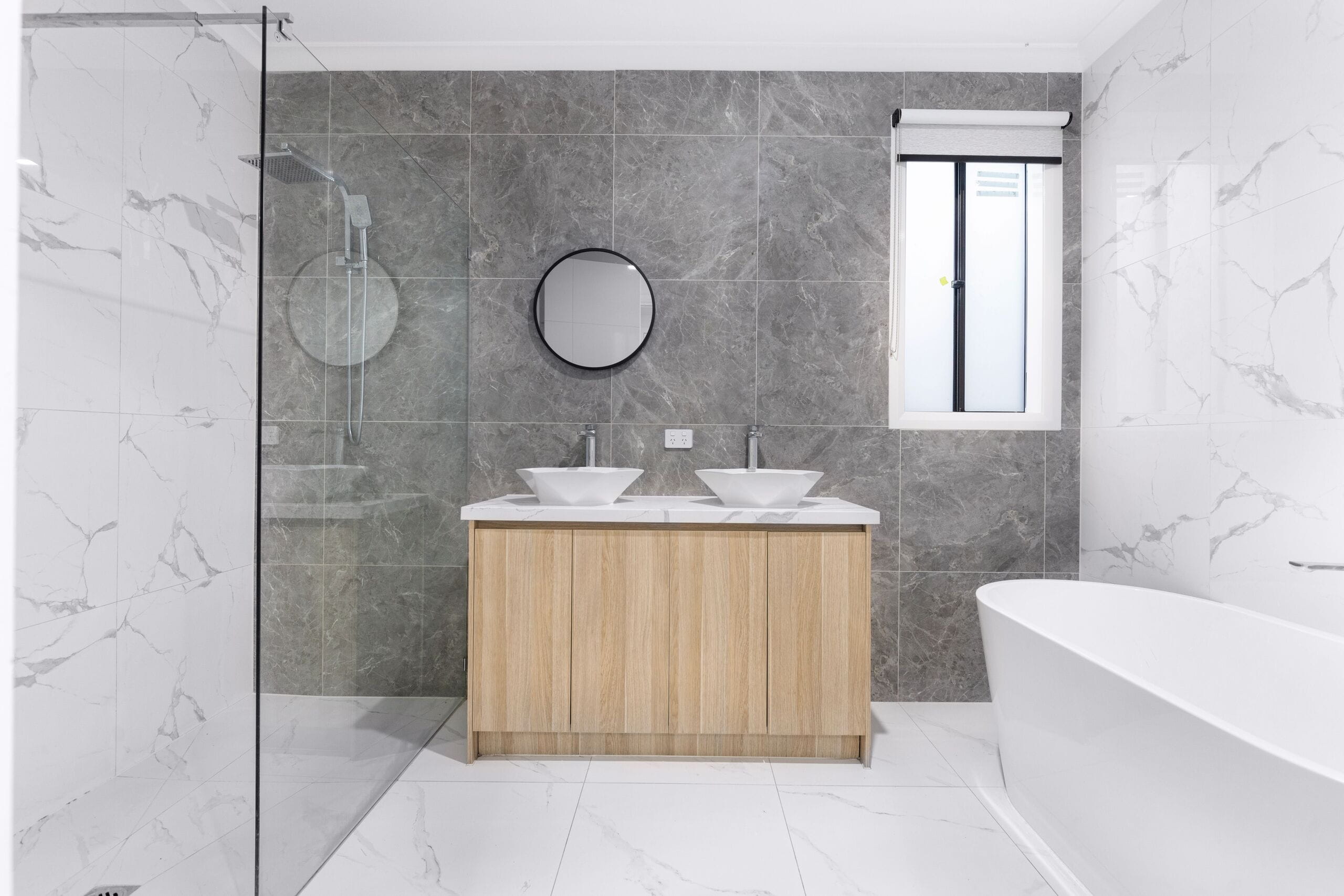 Large format tiles on a Perth bathroom wall and floor